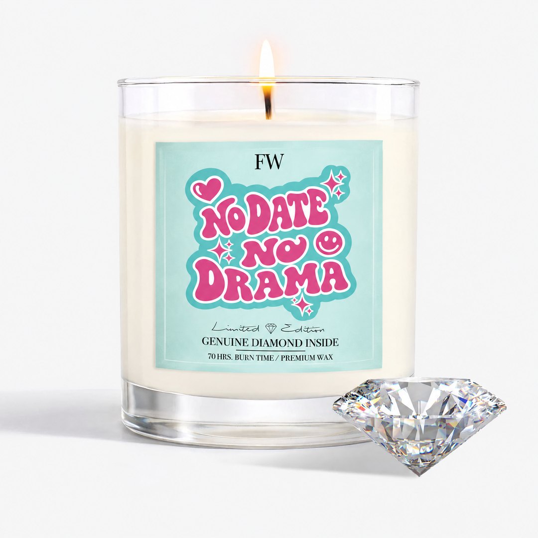 No Date No Drama Diamond Candle lit, with a genuine diamond beside it