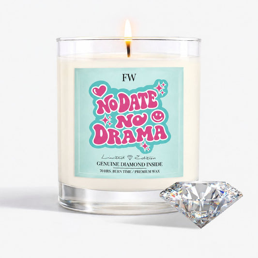 No Date No Drama Diamond Candle lit, with a genuine diamond beside it