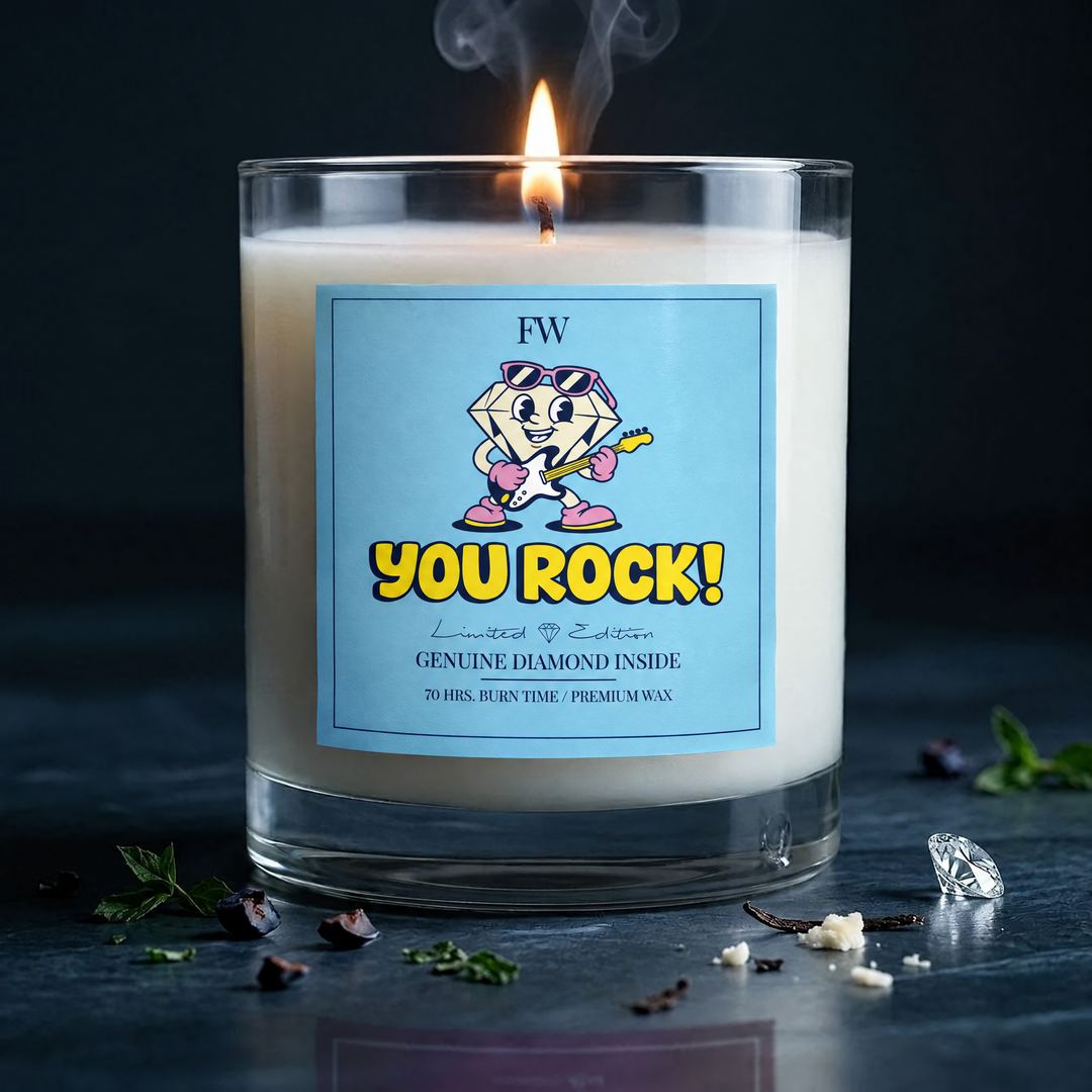 You Rock Diamond Candle burning on a dark table