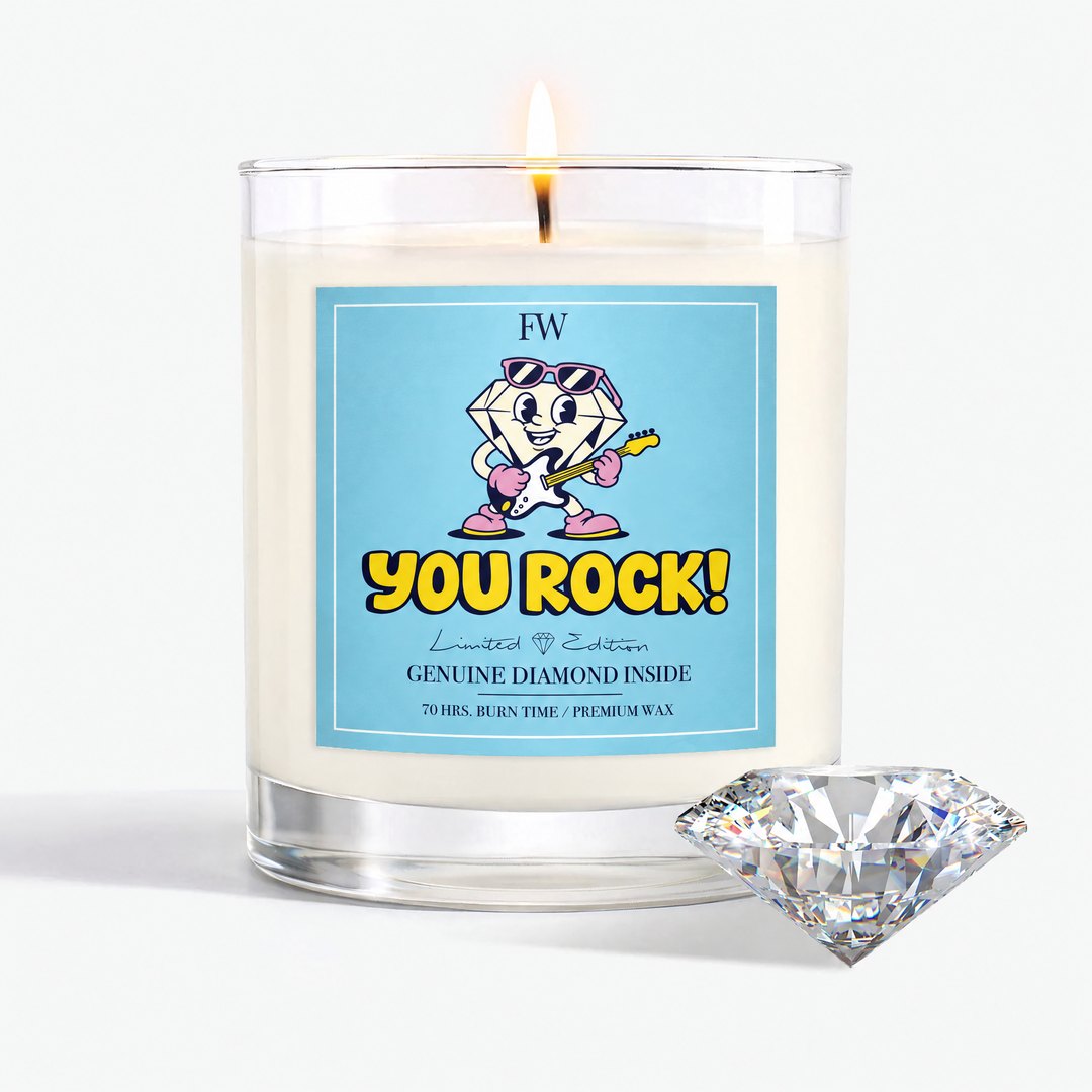 You Rock Diamond Candle lit, with a genuine diamond beside it