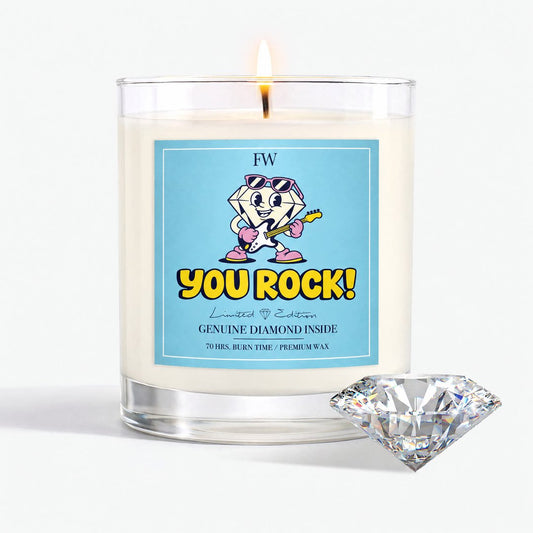 You Rock Diamond Candle lit, with a genuine diamond beside it